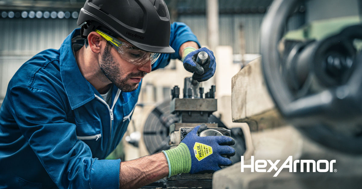Manufacturing worker wearing the Helix 3051 ultra-thin safety glove.