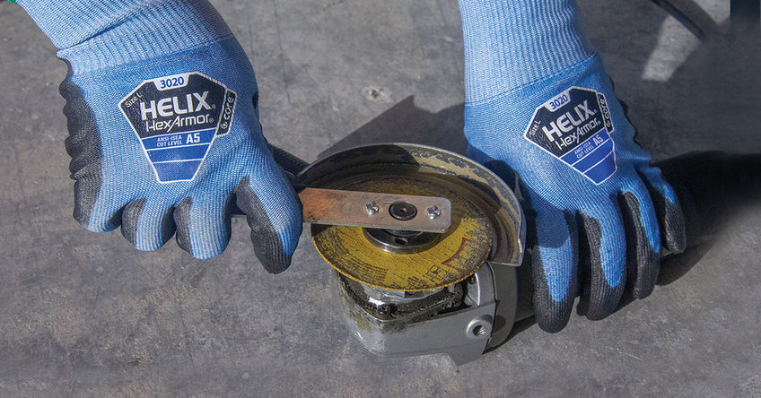 Hands wearing Helix 3020 using a tool to showcase the dexterous nature of HexArmor's cut-resistanct seamless knit gloves.
