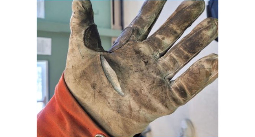 Dirty Chrome SLT 4064 glove with cut in the leather that did not go all the way through.