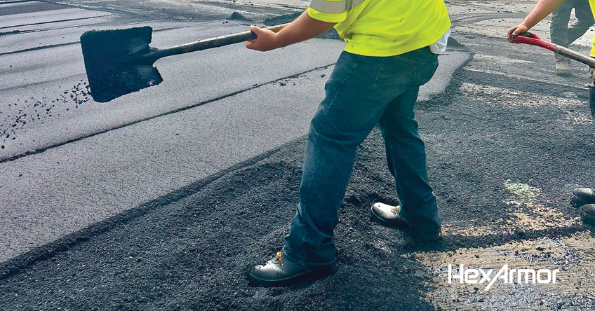 HeatArmor work boots being worn during hot pavement work. 