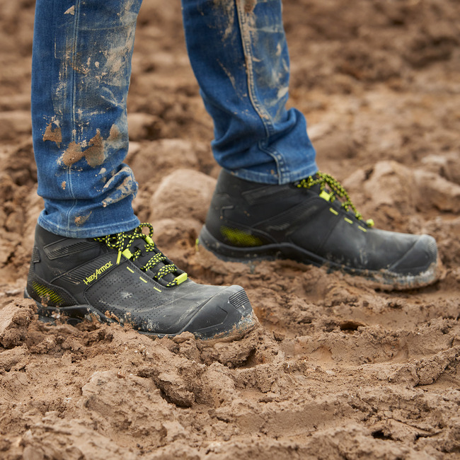 Worker standing in Xbase comfortable safety boots on construction site.