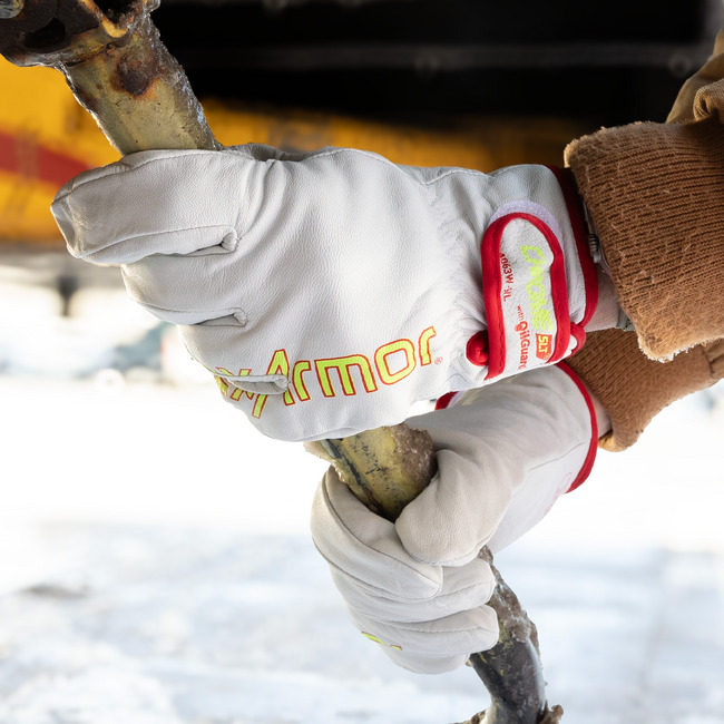 Hands gripping metal rod with the Chrome SLT 4063W cold weather gloves showcasing goatskin leather palm with 360-degree cut-resistance.
