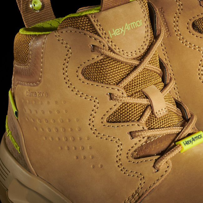 Up-close view of Xtend tan mens work boot’s lacing system for superior fit and comfort.