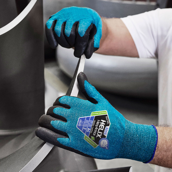 Hands wearing the Helix 3055 eco gloves working with sharp metal.