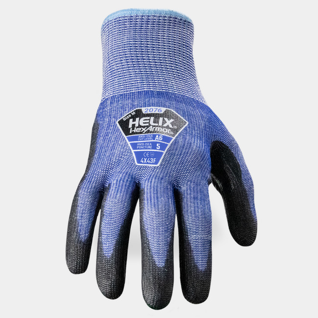 Back of hand view of Helix 2076 abrasion-resistant gloves, showcasing the glove label and HPPE/steel/fiberglass blend shell.