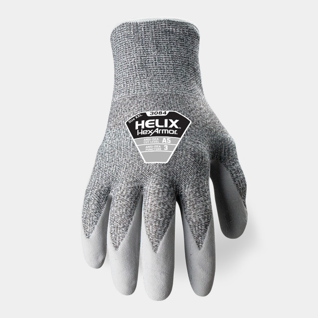 Back of hand view of Helix 3084 high-dexterity work gloves, showcasing the glove label and HPPE/steel blend shell.