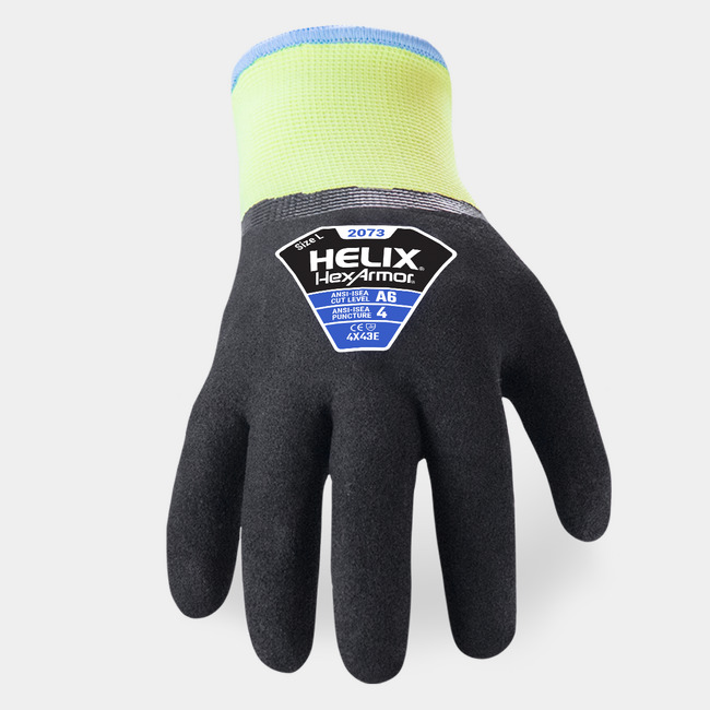 Back of hand view of Helix 2073 high-dexterity winter work glove, showcasing the glove label and acrylic/fiberglass blend shell.