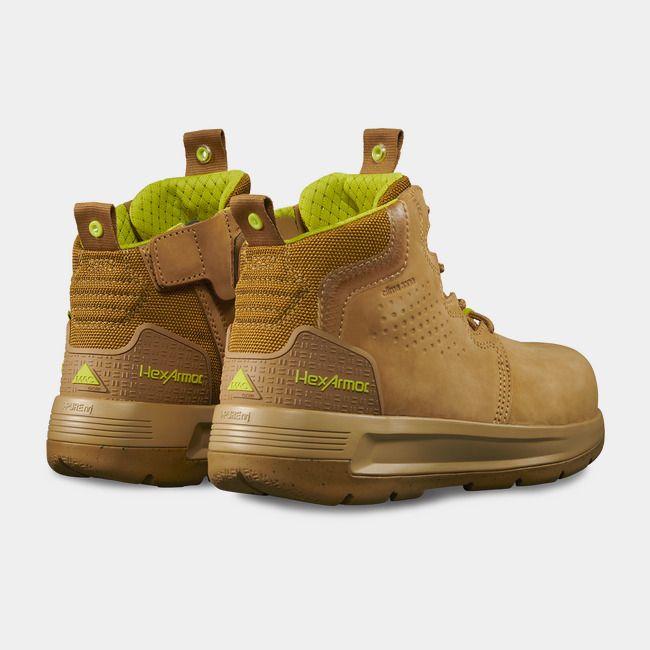 Back side of side zip work boot showcasing Xtend’s hi-vis details on the liner and heel.