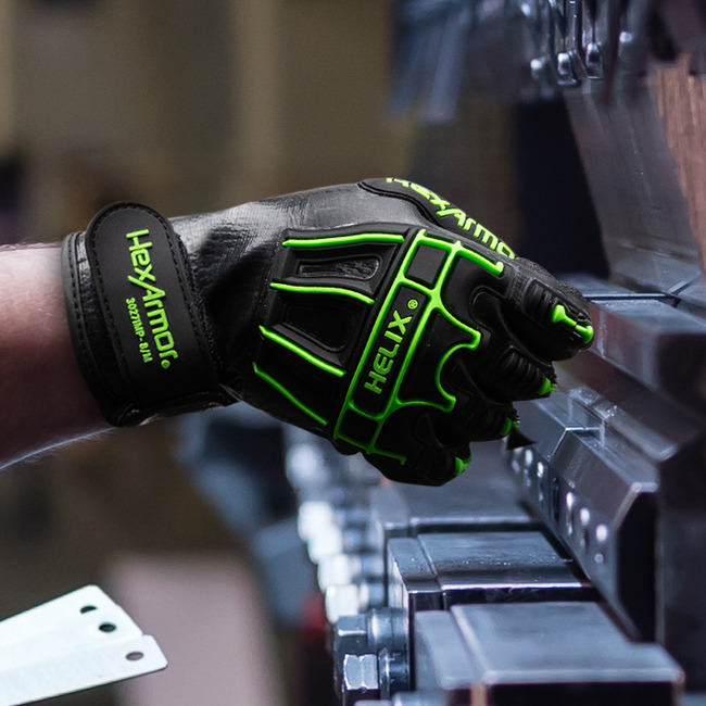 Hands wearing the 3027IMP high-dexterity work glove on the job.