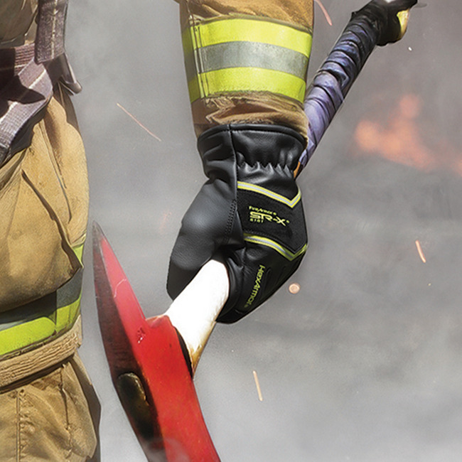 FireArmor SR-X 8181 structural firefighting gloves being worn by a firefighter.