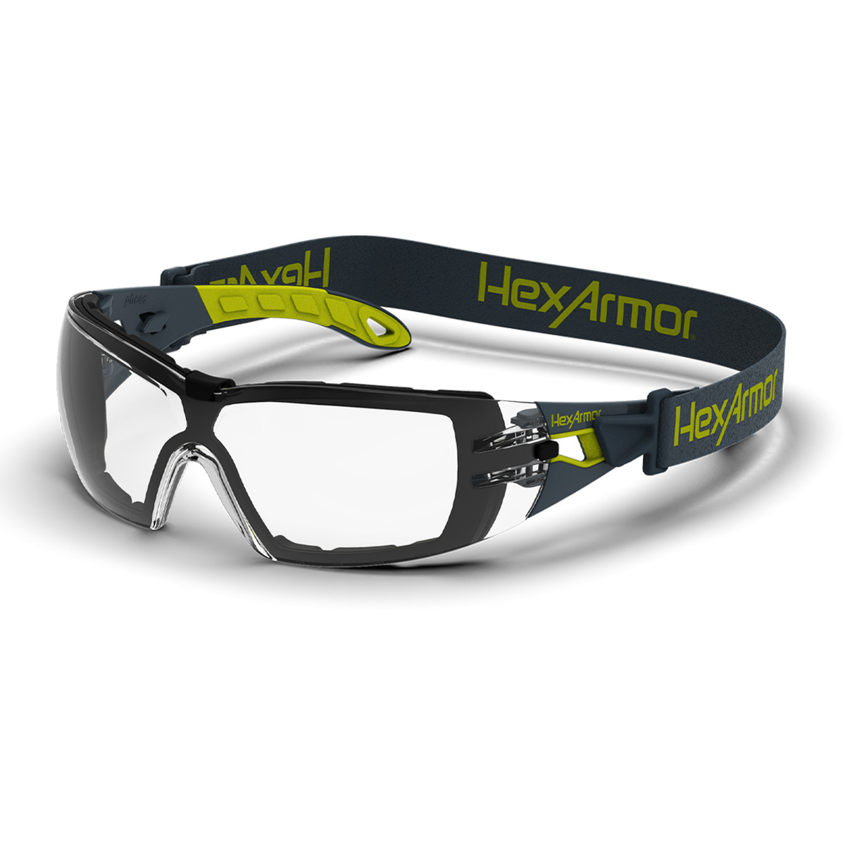 Grey and yellow MX200G anti-fog safety spoggles with head strap and foam gaskets shown as they are sitting on a table.